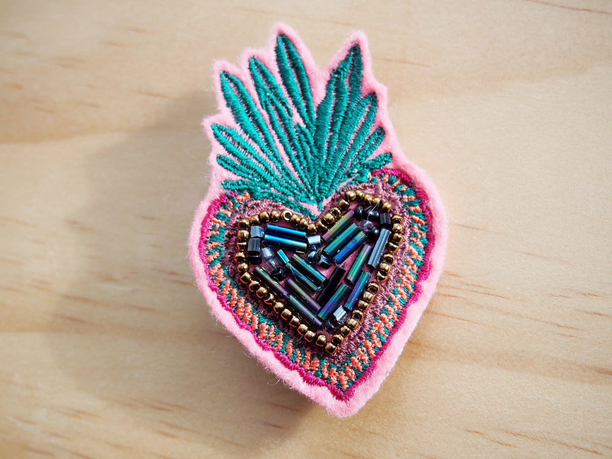 Sacred top heart brooch
