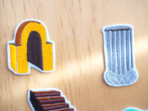 Composition separated patches embroideries